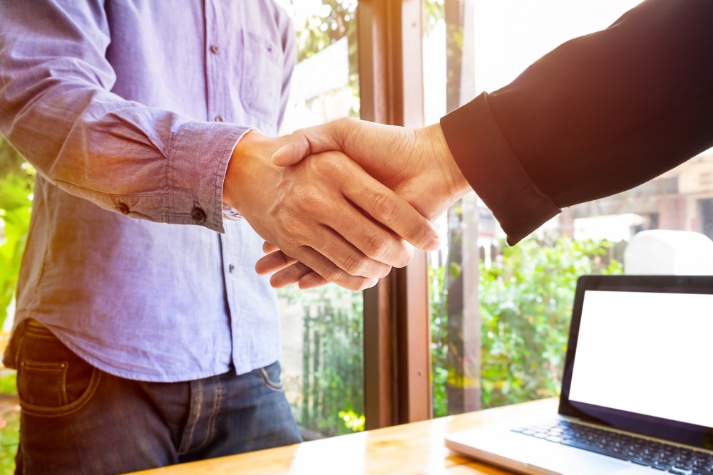 two business men shaking hands
